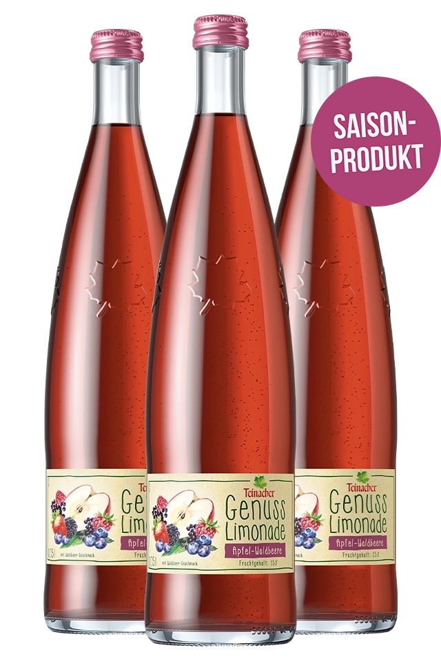 Drei Teinacher Genusslimonade Apfel-Waldbeere Glasflaschen mit roter Limonade
