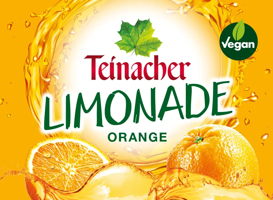 Etikett Teinacher Limonade Orange mit orangem Hintergrund und Orangenmotiv