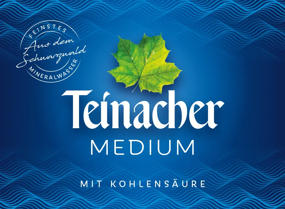 Etikett Teinacher Medium Mineralwasser mit Kohlensäure und dunkelblauem Hintergrund