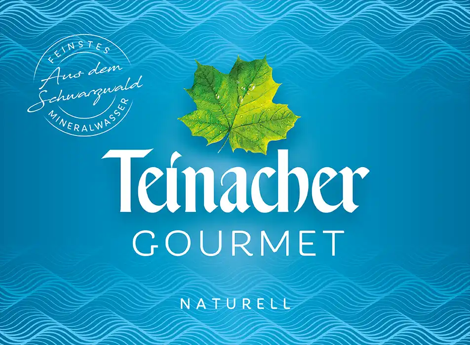 Etikett Teinacher Gourmet Naturell Mineralwasser ohne Kohlensäure mit hellblauem Hintergrund
