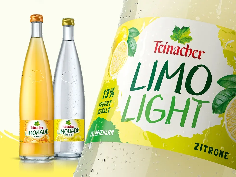 Teinacher Limonade Orange und Zitrone neben einer Teinacher Limo Light Zitrone Flasche im Detail