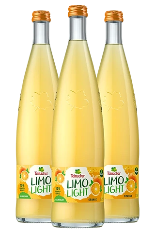 Drei Glasflaschen Teinacher Limo Light Orange in der Genussflasche 0,75 L