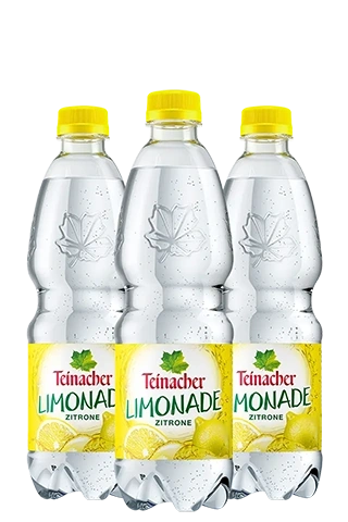 Drei 0,5-Liter-PET-Flaschen Teinacher Limonade Zitrone mit spritzigem Inhalt und gelbem Etikett